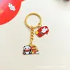 Día Nacional Estilo Chino Nuevo Dibujo Animado Creativo Metal Panda Gota de Aceite Llavero Festivo Colgante de Bolsa Colgante Pequeño Regalo