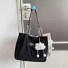 Bolsa feminina 2026 outono nova estilo coreano bolsa escolar estudantil simples moda bolsa de ombro grande capacidade bolsa tote para o dia a dia