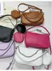 Bolsa de mão feminina estilosa 2026 nova bolsa de ombro transversal estilo coreano versátil bolsa mãe e filho estilo coreano bolsa baguete casual