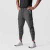 Pantalones Deportivos Casuales para Hombre Transfronterizos Fitness Elásticos Tejidos de Nailon Ajustados para Correr Entrenamiento Pantalones Cónicos para Hombre