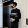 Nueva tendencia de moda otoñal e invernal para hombre, suéter clásico versátil, estilo coreano moderno, de manga larga, cuello de solapa, tejido de punto ajustado