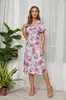 Amazon transfronterizo verano 2022 nuevo vestido estampado de cuello en V sin mangas de gasa con falda amplia vestido de playa para mujer en stock