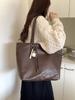 Bolsa Tote de Couro Macio Elegante e Simples 2026 Nova Bolsa Grande de Alta Capacidade para o Dia a Dia Feminina Estudantes Universitárias Indo para a Aula Bolsa Grande de Ombro Único