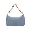 2026 principios de otoño moda nueva y moderna cadena de playa cadena de cuentas de paja bolso de hombro para debajo del brazo para mujer