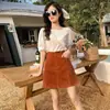 Saia midi de veludo cotelê roxo estilo Hong Kong para mulheres, primavera e outono, cintura alta, modeladora, fenda, saia lápis, simples, justa ao corpo, saia curta evasê