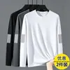 Camiseta casual masculina versátil de cor sólida para o outono 2026, gola redonda solta, manga longa, top moderno