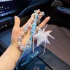 Nuevo llavero colgante creativo personalizado de cuadros y estrella para coche estilo ins cuerda trenzada hilo de cuentas pentagrama decoración de bolsa
