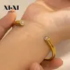 Diseño único de nicho pulsera de acero de titanio de alta calidad para mujer simple de acero inoxidable irregular cerrada divertida pulsera al por mayor