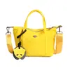 Nova Mini Bolsa Tote Colorida Macaron de Nicho, Bolsa de Ombro Transversal Portátil, Simples, Fashion, Leve e Tendência