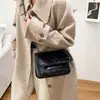 Bolso de alta gama para mujer 2026 nuevo de cuero encerado al aceite bolso hobo para el trabajo cadena un solo hombro también bueno bolso de mano bolso cruzado