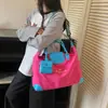 Bolsa de viagem bicolor para mulheres, bolsa de mão de grande capacidade e bolsa transversal, design de nicho 2026, bolsa de armazenamento personalizada para viagens curtas e viagens de negócios