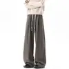 Calça reta masculina elegante e versátil de corte solto, calça larga moderna 2026 com caimento fluido, disponível em tamanhos grandes