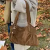 2025 Nova Bolsa Retrô Transfronteiriça Feminina Grande Capacidade Tendência da Moda Coreana Bolsa de Ombro Bolsa Tote de Alta Qualidade