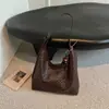 Bolsa de Ombro com Textura Trançada 2026 Nova Bolsa Feminina Personalidade Cor Sólida Retro Alta Aparência Para o Trabalho Bolsa Tote de Ombro Único