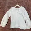 Camisa babydoll branca respirável 100% algodão para mulheres, novo estilo outono de 2026, blusa de gola redonda solta com mangas bufantes, camisa de proteção solar
