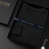 Suéter Masculino de Cashmere 2026 Gola Redonda Outono/Inverno Novo Estilo Cor Sólida Malha Amiga da Pele Para Jovens e Meia-Idade Camada Base Suéter Fino