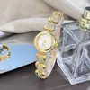 Reloj Pulsera Nuevo Estilo para Mujer con Forma de Corazón, Reloj de Cuarzo Popular Transfronterizo, Pulsera de Reloj Compacta para Mujer Incrustada con Diamantes, Venta al por Mayor por Fabricante