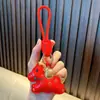 Llavero de Mascota Rojo Colgante para Bolsa de Año Nuevo Llavero de Pareja para Coche Día de Año Nuevo Pequeño Regalo Al por Mayor