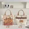 Nueva Bolsa de Lona Estilo Dibujo Animado Linda Gatito Bolso de Mano para Estudiante Versátil de Verano Ropa de Trabajo Bolsa de Gran Capacidad