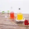 Botella de té con leche con tapa de aluminio rojo neto, botella de bebida para mascotas, botella de jugo transparente de 360 ml, botella de té frío de plástico de grado alimenticio, venta al por mayor