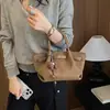 Bolso Cesta Tipo Dumpling de Gamuza para Mujer 2026 Verano Nuevo Ligero para Viajes Cotidianos Casual Versátil Hombro Único Cruzado de Mano