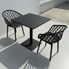 Juego pequeño de mesa y sillas redondas de acero al carbono simple para ocio en balcón, mesa de discusión, área de descanso, mesa de comedor para cafetería de té con leche al aire libre