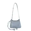 Bolso cruzado versátil de moda transfronterizo 2026, bolso de hombro súper popular de nicho, bolso tipo cubo de gran venta para mujer