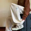 Pantalones de chándal Estilo Nuevo Otoño/Invierno 2024 para Hombre Tendencia Europea Algodón Terciopelo Pantalones Casuales para Hombre Rectos Largos Pantalones Pesados de Tres Rayas