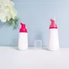 En stock botella cónica blanca de espuma de 60 ml, botella espumadora de PET para mousse de 100 ml, dispensador portátil de espuma facial