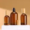 Botella de spray de perfume con prensa de bayoneta redonda color canela, 30 ml, 50 ml y 100 ml, venta al por mayor.