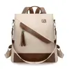 Mochila Casual Simples de Cor Contrastante 2026 Primavera Nova Prática para o Trabalho Grande Capacidade Antifurto Mochila Feminina