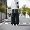 Moda de otoño e invierno para hombre, pantalones de trabajo deconstruidos modernos y únicos, pantalones de trabajo versátiles de estilo japonés con cordón, corte slim fit, holgados
