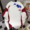 Camiseta Feminina Minimalista da Moda com Design Color-Blocking de Manga Curta, Nova Coleção Verão 2026 Casual Soltinha Top para o Dia a Dia