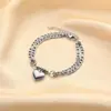 Joyería de titanio y acero inoxidable europea y americana transfronteriza, pulsera de amor de acero inoxidable en oro y plata, pulsera ajustable para parejas, venta al por mayor para hombres y mujeres