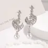 Pendientes Colgantes de Perla Luna Estrella Ultra Exquisitos para Mujer, Lujo Ligero, Gama Alta, Pendientes Brillantes con Sentido de Elegancia y Temperamento