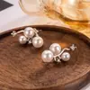 Nuevos Pendientes de Tachuela con Perlas Artificiales Colgantes de Estrella Completas 2026 Sentido de Alta Gama Lujo Ligero Nicho Temperamento Único Pendiente Exquisito