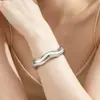 Pulseras Circulares Africanas Anchas de Venta Caliente Transfronterizas Europeas y Americanas, Pulseras Irregulares de Lujo Ligero de Alta Gama a la Moda y Joyería al por Mayor