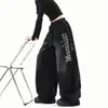 Jeans Lavados Negros Degradados Desgastados Tipo Cimitarra para Hombres y Mujeres Ropa de Calle Retro Sueltos de Pierna Ancha Pantalones de Jazz con Letras