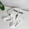 Calcetines deportivos de invierno con rosca para hombre, calcetines blancos de otoño e invierno para mujer, calcetines de equitación con letras, moda, venta al por mayor