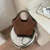 Bolsa de Mão Estilo Novo Coreano 2026 Moda Feminina Ombro Único Pequena para Trabalho Diário Padrão Trançado Transversal Pequena Nicho Diagonal Outono