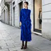 Venta caliente transfronteriza Miyake alta gama sentido volantes vestido midi mujer otoño temperamento estilo suave elegante falda de manga larga