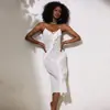 Vestido de malla transparente con lentejuelas estilo europeo y americano Feiyun con tirantes de cadena, dobladillo con volantes y abertura, vestido formal de longitud media 1279