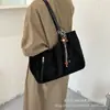 Bolso tote retro de gamuza casual de alta gama para mujer, nuevo 2026, bolso de hombro simple y moderno de gran capacidad