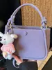 Bolso de cubo transfronterizo para mujer, nuevo modelo 2026, bolso de mano versátil con un toque de alta gama, bolso casual de hombro y cruzado, bolso suave de cuero para el hombro