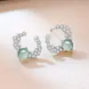 Cuenta de Video Más Vendido Grado A Natural Jade Azul Agua Aretes de Perlas Redondas Nuevo Estilo Chino Versátiles para Viajar Lujo Ligero Arete de Nicho
