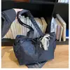 Bolso de Mano para Viajes Transfronterizos de Gran Capacidad Nueva Moda Primavera 2026 Versátil de Alto Valor Bolso Tote para Hombro o Axila