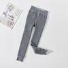 Leggings de invierno para niños de alta elasticidad, nuevo para otoño, con rayas verticales, protección catiónica en la cintura, ropa exterior elegante, con pies, venta al por mayor de fábrica
