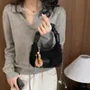 Bolso Retro Melanoid para Axila de Mujer Otoño 2026 Nuevo Bolso Tote con Parches de Gamuza Color Bloque de Nicho Bolso de Hombro Único de Mano