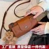 Bolsa de Almohada Cilíndrica 2025 con Incrustaciones de Dragón de Alta Calidad Nueva Moda Mini Bolso de Hombro Nicho para Viajes Diarios Bolso de Cuero para Mujer