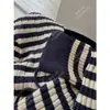 Vestido de punto a rayas de manga corta con cordón estilo nórdico nuevo de primavera temprana Yuran 26
